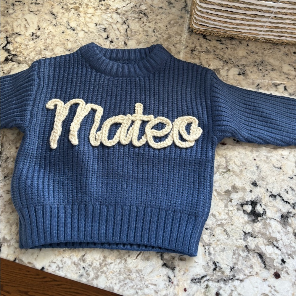 Brand new custom baby sweater. I ordered the wrong name
